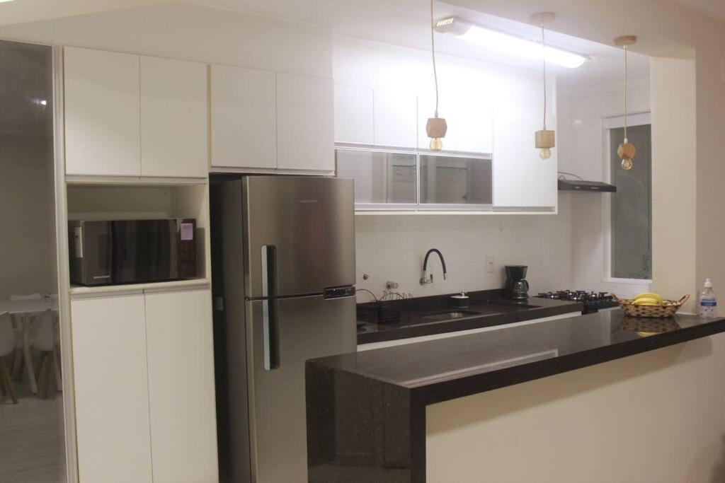 Ap Confortavel - Enseada Apartment *